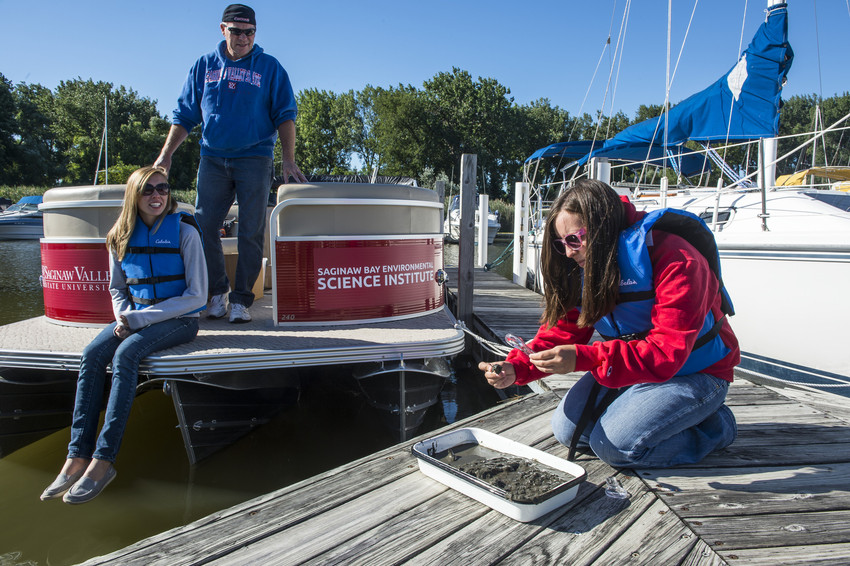 Students and staff conduct environmental research.